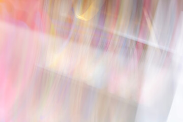 Abstract motion blur effect. Blurred image of colorful holiday bokeh lights.