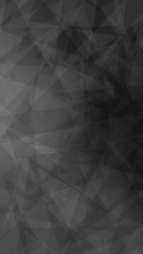 triangle shapes animate on black and gray gradient background vertical footage video clip. short video clip