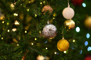 Christmas balls on the Christmas tree Colorful decoration, Christian New Year celebration, Selective focus