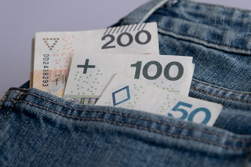 Polish zloty money cash in a jeans pocket