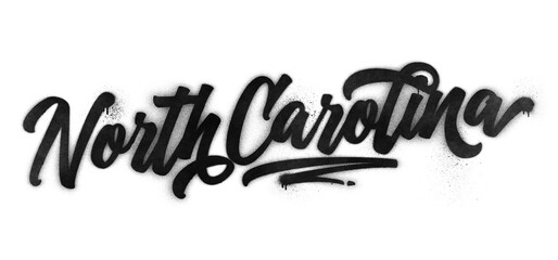 Fototapeta premium North Carolina state name written in graffiti-style brush script lettering with spray paint effect isolated on transparent background