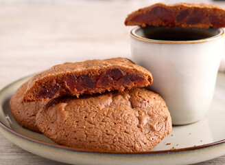 Chocolate cookies with cranberry on plate