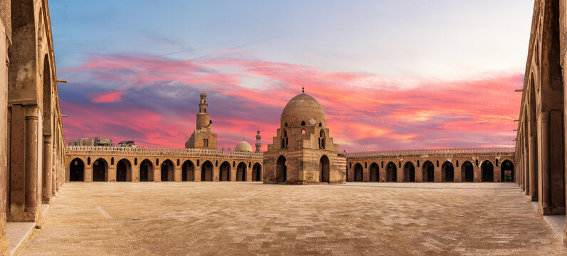 Inner yard of Mosque Ibn Tulun, wonderful sunset of a famous place of Cairo, Egypt