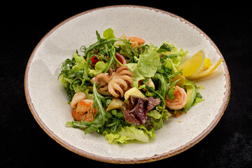 Seafood salad, octopus, shrimp, scallop, squid and mixed greens