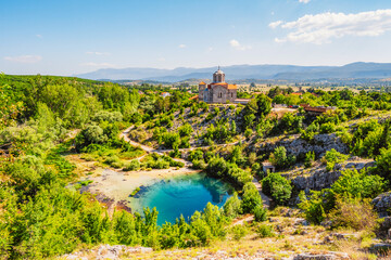 Dalmatia hinterland. Cetina river source and Orthodox church Dalmatian Zagora region of Croatia
