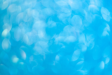 Abstract blurred background. Defocused portrait lens back. Backdrop bokeh. Vivid blue.