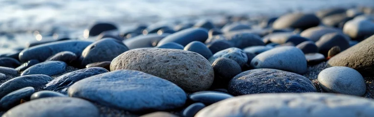 Fotobehang Little stones and a backdrop of rocks © BrandwayArt
