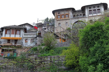 Ottoman-style dwellings made of stone on the slope down the hill surrounding the citadel. Gjirokaster-Albania-183