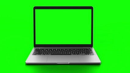 Laptop with green screen on display rotates into view in front of greenscreen.