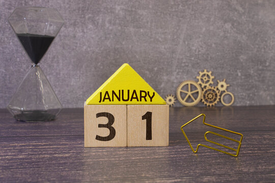 Cube shape calendar for January 31 on wooden surface with empty space for text, new year Wooden calendar with date