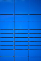 close up of a blue and white office building