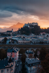 Historic of Salzburg with Hohensalzburg fortress with dramatic sky at sunset, Salzburg Land, Austria