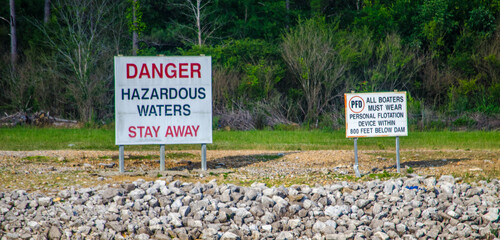 warning signs below dam