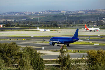 Passenger planes zigzagging along the runways