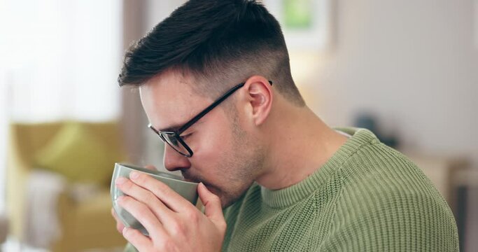 Man, coffee and drink in home, thinking and smell aroma with ideas, memory or vision with energy in morning. Guy, relax and peace with tea cup, espresso or latte for breakfast, brain power and quiet