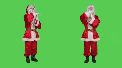 Saint nick feeling exhausted in studio, showing timeout symbol to express burnout while he is...