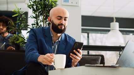 Manager on executive meeting videocall presenting investment plan to CEO and consultants. AI developer discussing software program to obtain profit, small business development work. Handheld shot.