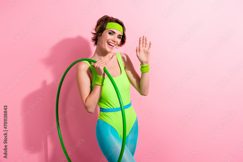 Wall mural photo of lady pilates yoga sportswoman recording video on sport blog with hula hoop isolated pastel 