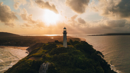 Ilha do Mel - Paraná. Aerial view of the Conchas lighthouse and beaches of Ilha do Mel - Powered by Adobe