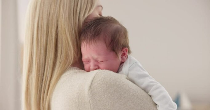 Comfort, mother and a crying newborn for love, care and sad in the morning. House, family and a young mom or woman with affection, support and holding a baby, child or kid for sleep, rest or tired