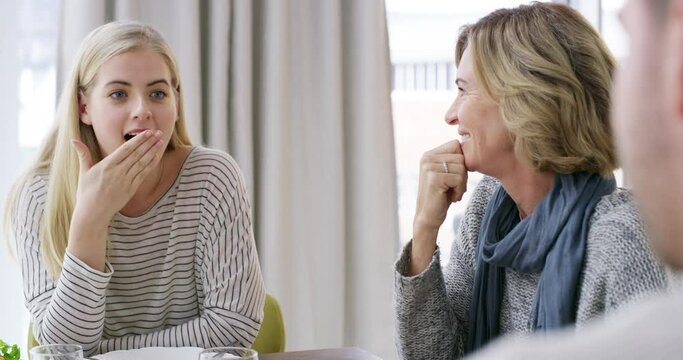 Mother, siblings and announcement for gossip, surprise or news in living room together at home. Mom, brother and sister smile talking in shock for communication, social or bonding by table at house