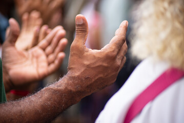 Hands of a religious person in prayer. - obrazy, fototapety, plakaty