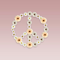 Hippie peace symbol made of beautiful flowers on dusty pink background