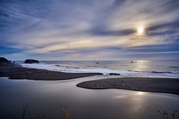 Russian River flowing into the Pacific ocean at sunset © David