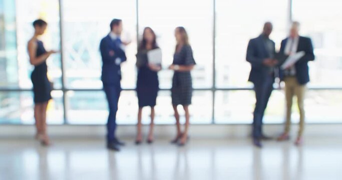 Business people, window and documents for networking, discussion and planning with information, tablet and chat. Men, women and ready for workshop, proposal and development at job in blurred lobby