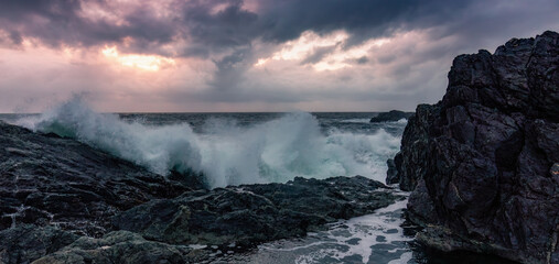 Waves on Rocky Shore in Tofino. West Coast of Pacific Ocean.