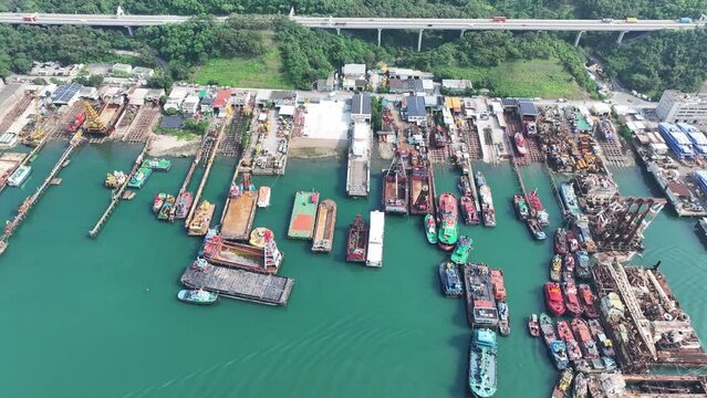 Tsuen Wan Kwai Chung And Tsing Yi ,a Commercial And Residential Seaside Satellite Town, Built On A Bay In New Territories Of Hong Kong, Aerial Drone City Skyview