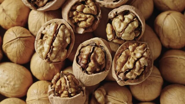closeup of Walnuts and walnuts kernel background.