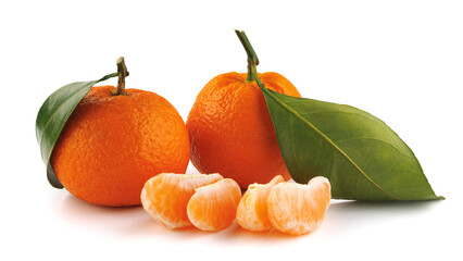 Two ripe tangerines and tangerine slices isolated on a white background. Organic tangerine with green leaf. Mandarin.