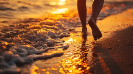 Poster Closeup of woman feet walking on sand beach © waranyu