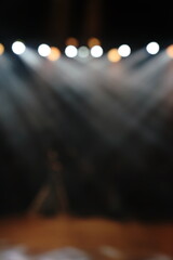 Defocused entertainment concert lighting on stage, blurred disco party and Concert Live.