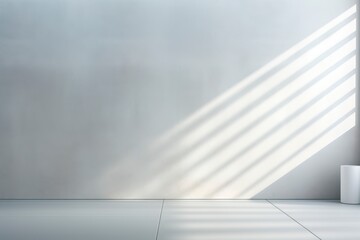 Empty white wall where sunlight shining through a window - obrazy, fototapety, plakaty