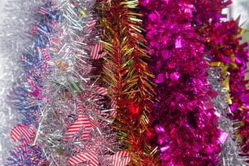Colorful Christmas tinsel as a background