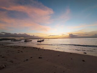 The beautiful and pretty sunset view on Nusa Penida Island with a beautiful orange sky