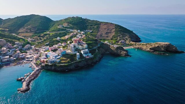 Aerial view of tourist resort hotels and Livadi Beach in Crete, Greece. Luxury villas by Bali Seaside Village with turquoise crystal clear water on Greek Island.