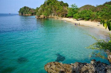 Beautiful Beach with white sand and clear skyline in Malang