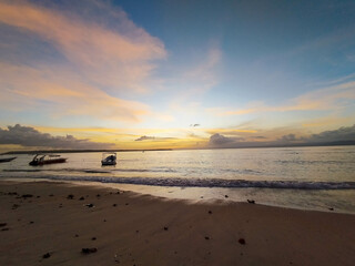 The view of the sunset in Nusa Penida is very beautiful and enchanting with an orange sky