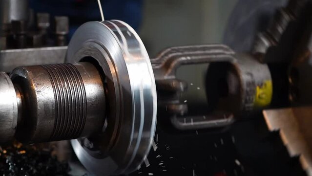 Close up of a factory worker in china working on a lathe, workplace safety, cinematic