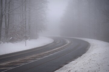 Bad weather driving - foggy hazy country road. Motorway - road traffic. Winter time. Autumn - fall....