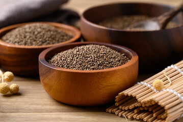 Perilla seed in wooden bowl, Healthy herbal seed ingredients in Asian food