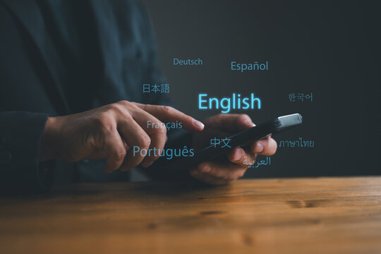 Translator app, language course and e-learning concept. Person use smartphone with Translator app, translation or translate on the mobile app worldwide language conversation speaking concept.