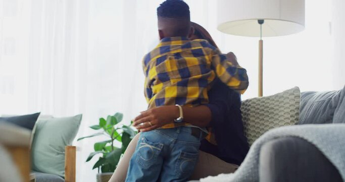 Running, hug and mother with boy child on a sofa happy, care and bonding in their home together. Excited, love and black family embrace in a living room with fun, smile and playing weekend games