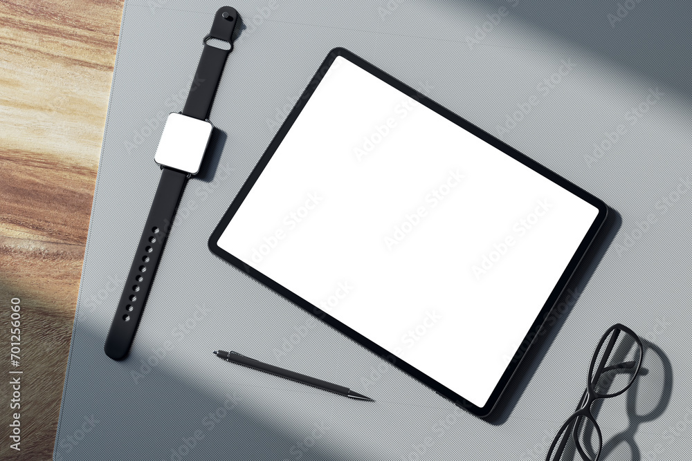Poster top view of empty white tablet screen, digital watch, pen and glasses on wooden tablet. devices at w