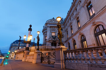 Fototapeta na wymiar Romantic cityscape of the majestic facade of the Opera Garnier by night in Paris.