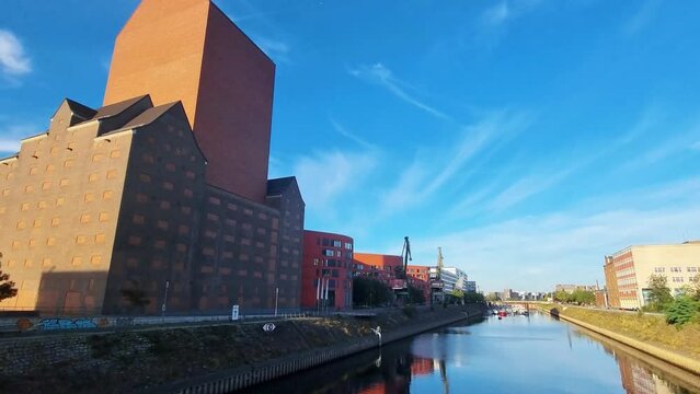 German industrial towns: Duisburg harbor and the brick building containing the state archive
