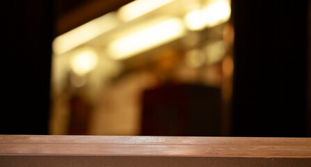 image of a wooden table on a blurred bokeh background